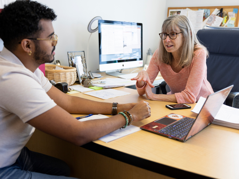 Mary Ann Moran in Office with student